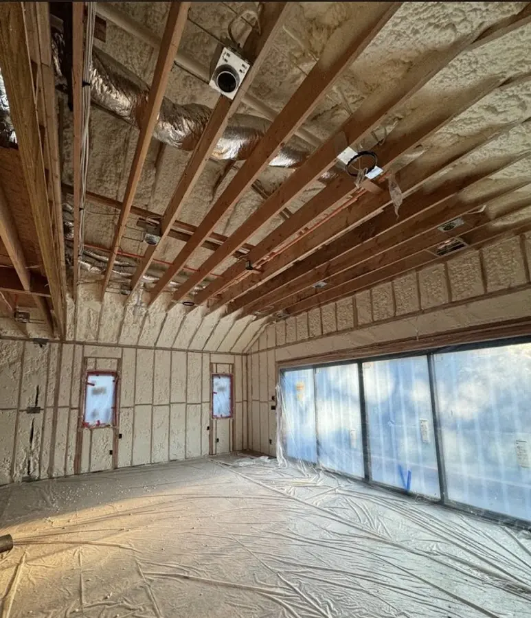 Interior walls and ceiling insulated with spray foam during new construction in Perryville